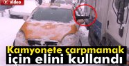 çarpmamak için elini kullandı