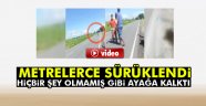 Metrelerce sürüklendi, hiçbir şey olmamış gibi ayağa kalktı