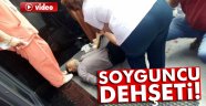 soyguncu çalışanları vurdu