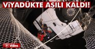 Viyadükte asılı kalan tırın sürücüsünü itfaiye kurtardı